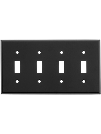 Classic Four Gang Toggle Switch Plate In Matte Black.